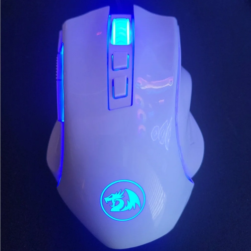 Hardly used all white red dragon mouse. Multi colors with 6ft cord